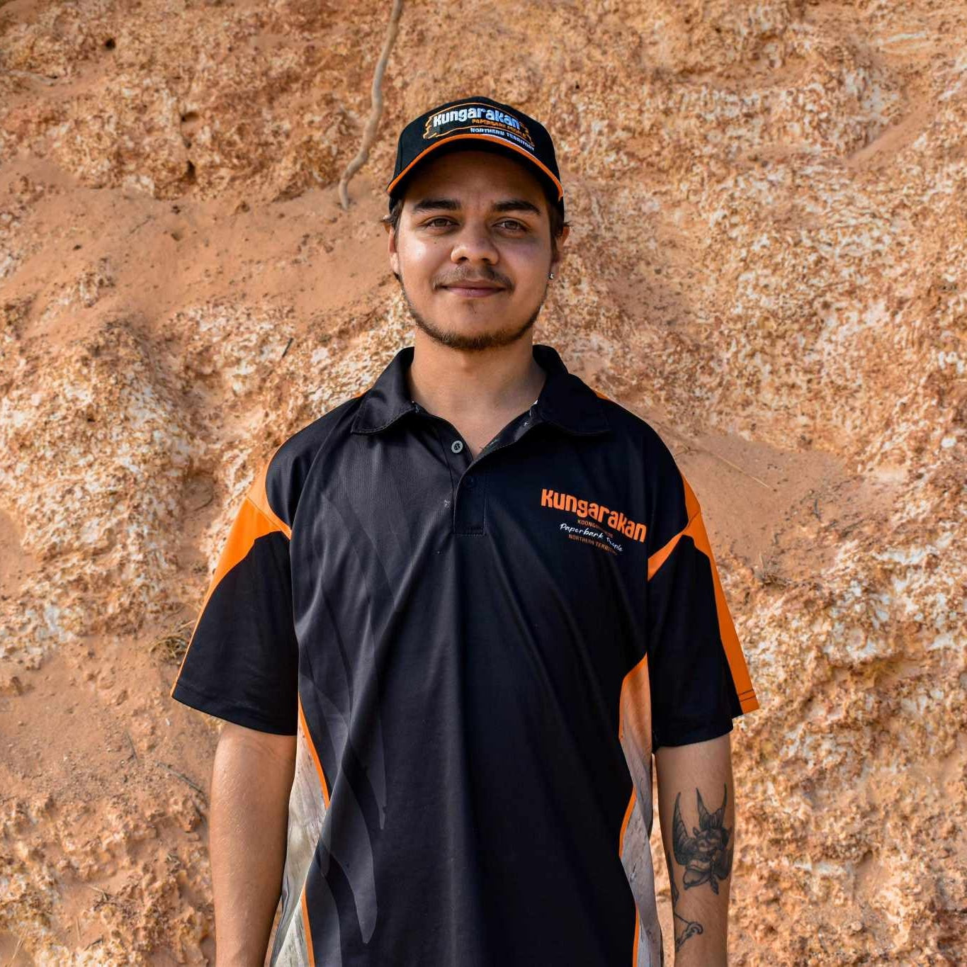 POB001 POLO - Black With Faded Orange Panel